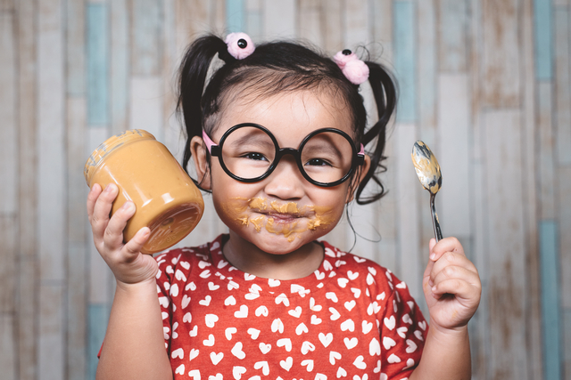 Child with peanut butter